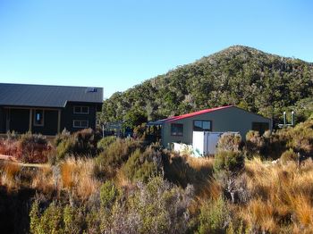 The new and the old huts at Perry Saddle. The old one on the right has now been removed.